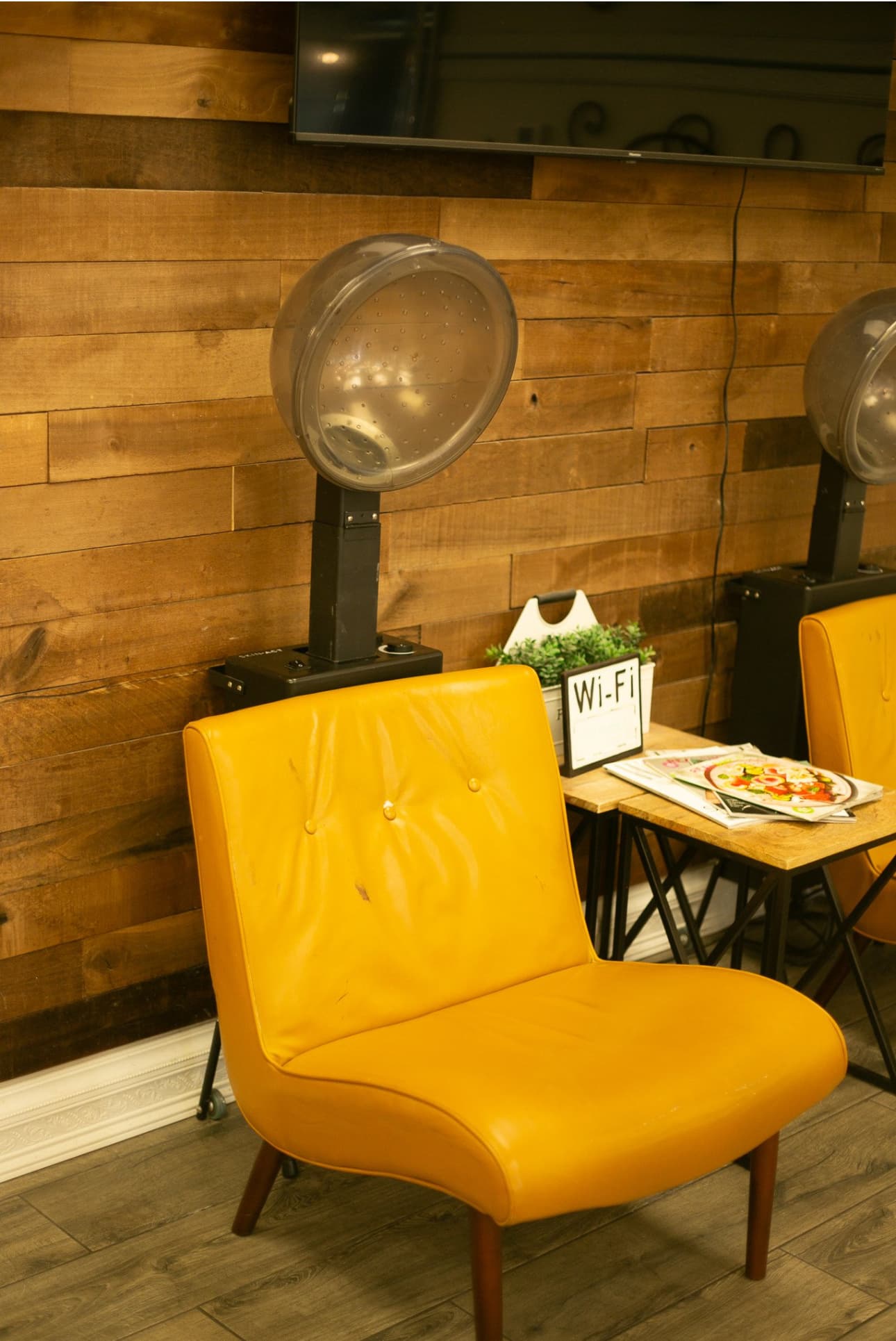 Vintage dryer chairs with rustic wood accent wall